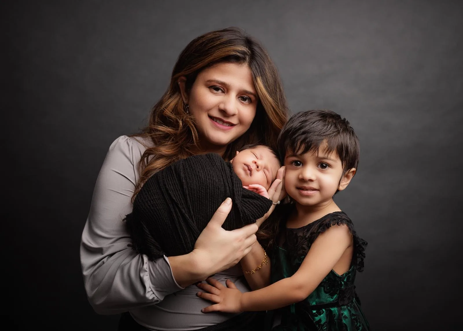 Dr. Deveshi Chandan with her two children