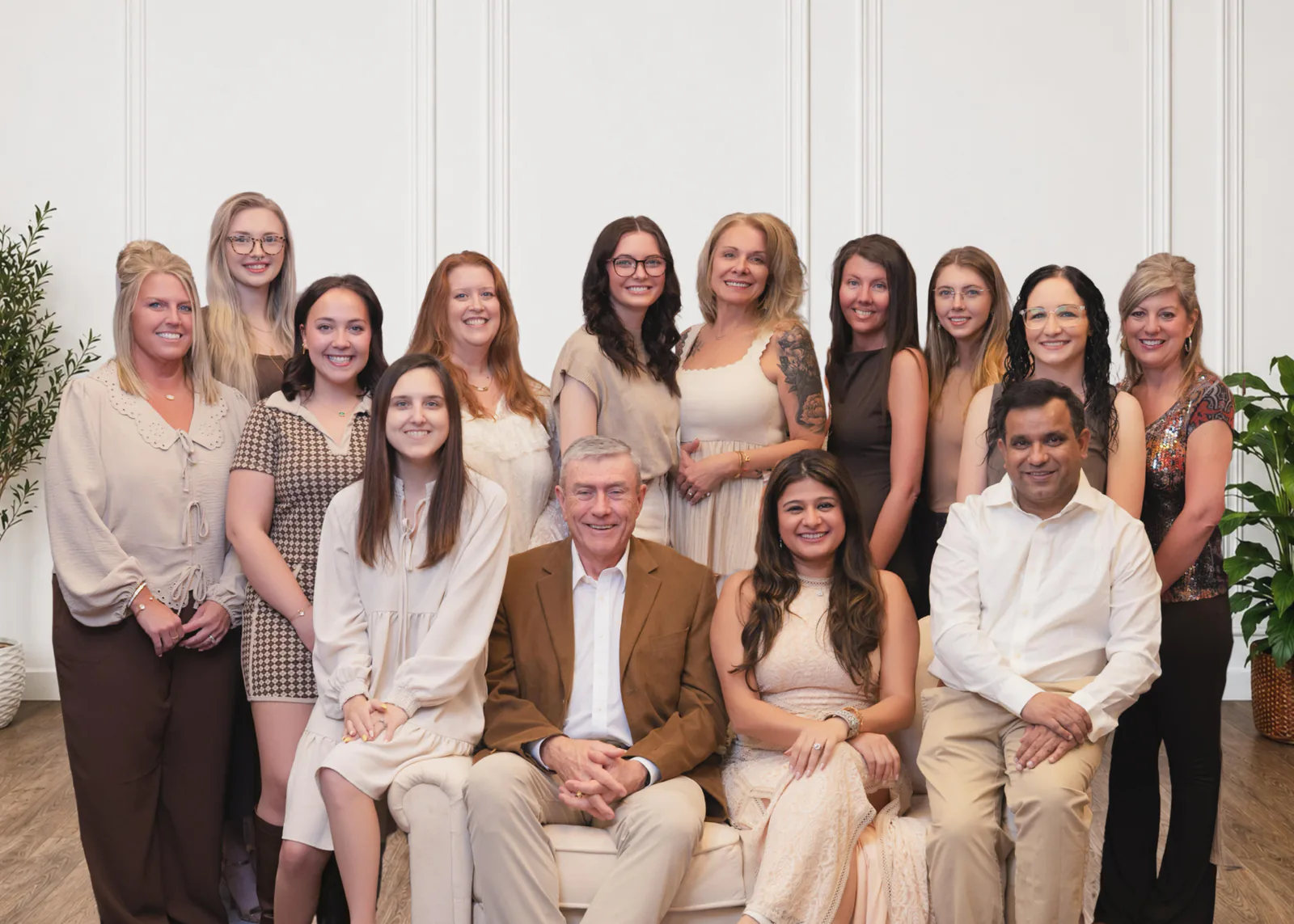 The Mars Family Dental dentists and staff gathered for a group portrait